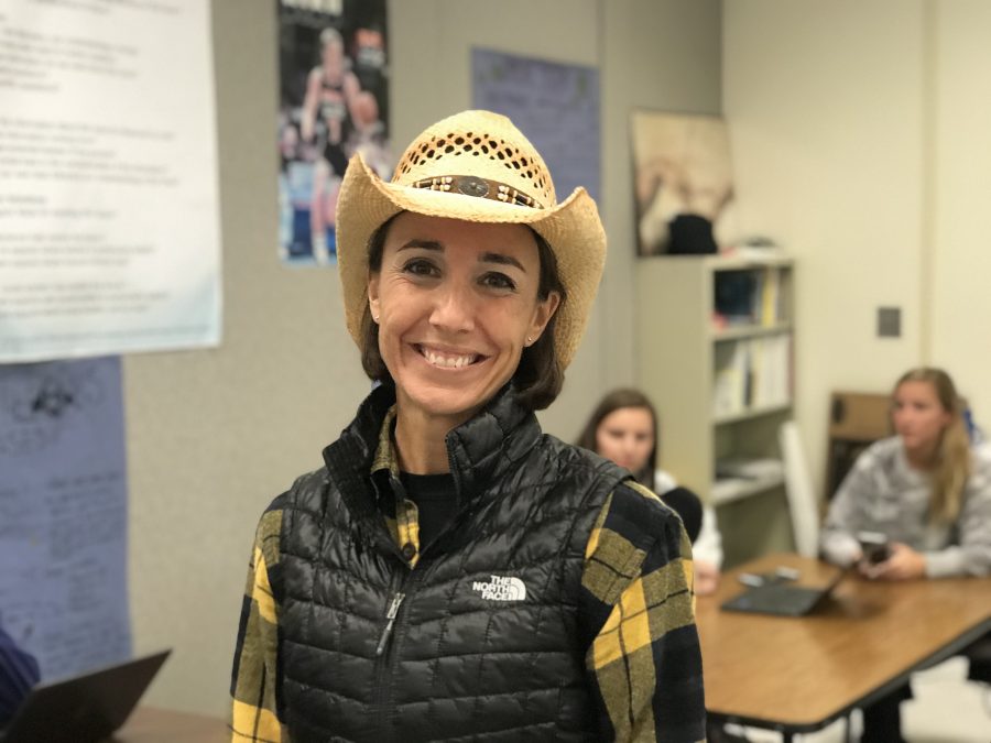 Science teacher Kerri Graham wears a farmer style thatched hat in her 4th block class to celebrate todays western theme. Photo by George Frey.