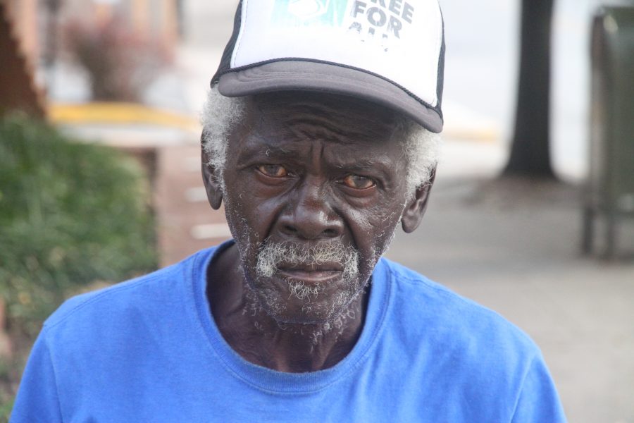Homeless Columbian James Allen sits on the corner of Broadway and 10th street in downtown Columbia asking for money. Photo by George Frey.