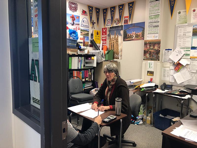 AVID coordinator Lisa Holt talks with a student. To pick up an AVID application form, go to her room (249) located in the North Commons or talk to your guidance counselor. Photo by Anna Xu 