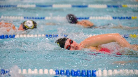 Sophomore Piper Forthaus swims freestyle at a 6 a.m. swim practice Friday, Dec. 7. Forthaus will compete at state this weekend. 