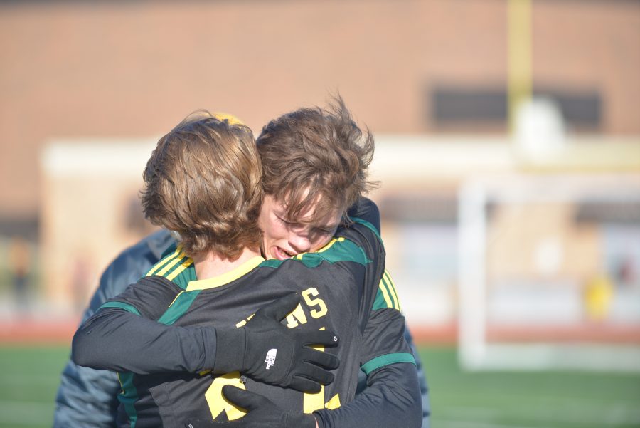 Senior forward Quintin Liddle hugs his teammate, junior midfielder Preston Fancher, after the game. Liddle was emotional when the final whistle blew, realizing he had just finished his final game as a Bruin. [This game meant] everything, Liddle said. And thats it.