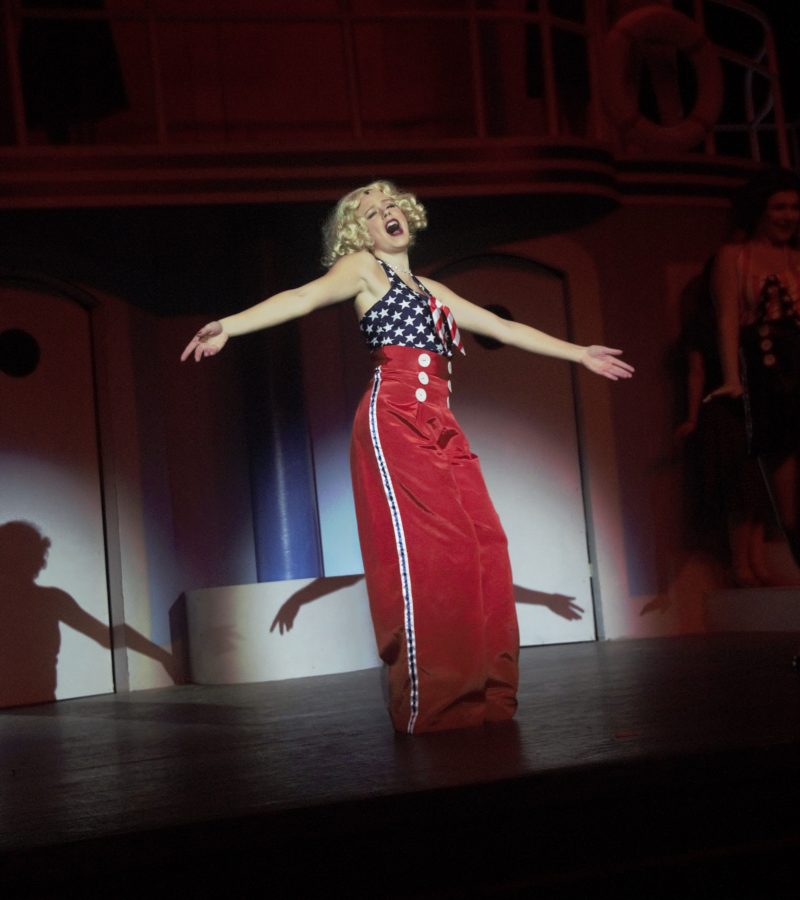 Marykate Grossman sings during rehearsals for Anything Goes. Grossman, a junior, played Reno and had nine costume changes in the musical. Photo by George Frey