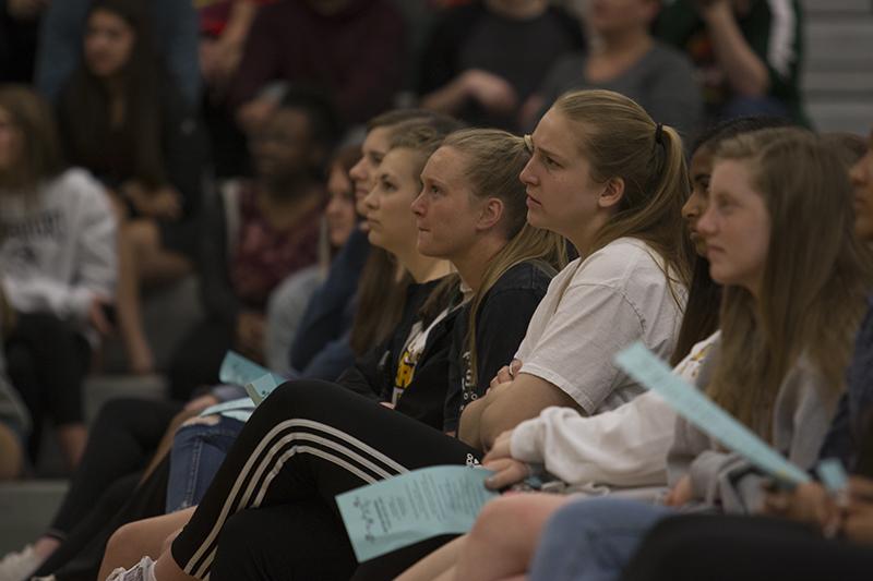 Students watch as Student council officer candidates make speeches at the spring assembly Friday, April 5, Photo by Gabi Tella. 