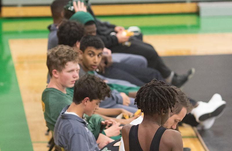 Rock Bridge JV wrestlers wait for their chance to take on Holt