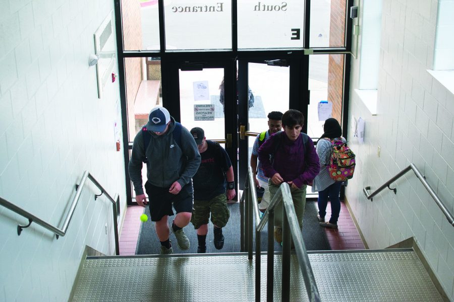 Students enter through the South Entrance, a door that may not be available next year. Photo by Audrey Snyder.
