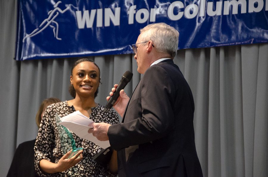 Junior Tyra Wilson smiles while being interviewed on stage after receiving the High School Sportswoman award at the WIN For Columbia luncheon on Tuesday Feb. 18, 2020. She said she was surprised to win but is happy to be recognized for her hard work. Photo by Maddie Marrero.