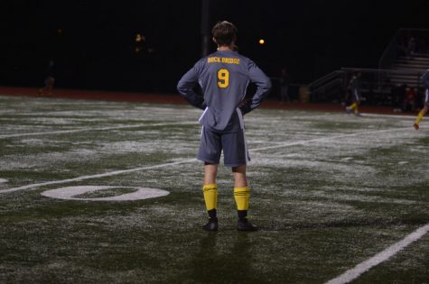 Senior Zeke Lage stares on in disbelief after the end of a game against Jefferson City High School. The Bruins lost in the district championship game 2-1 Nov. 7. (Photo by Ana Manzano)