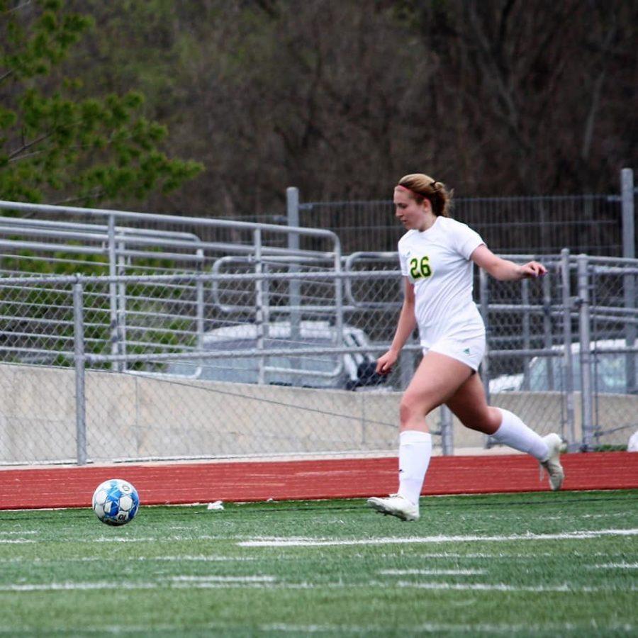 Current senior Savanah Cunneen dribbles the ball in the spring of her junior season before tearing her ACL.