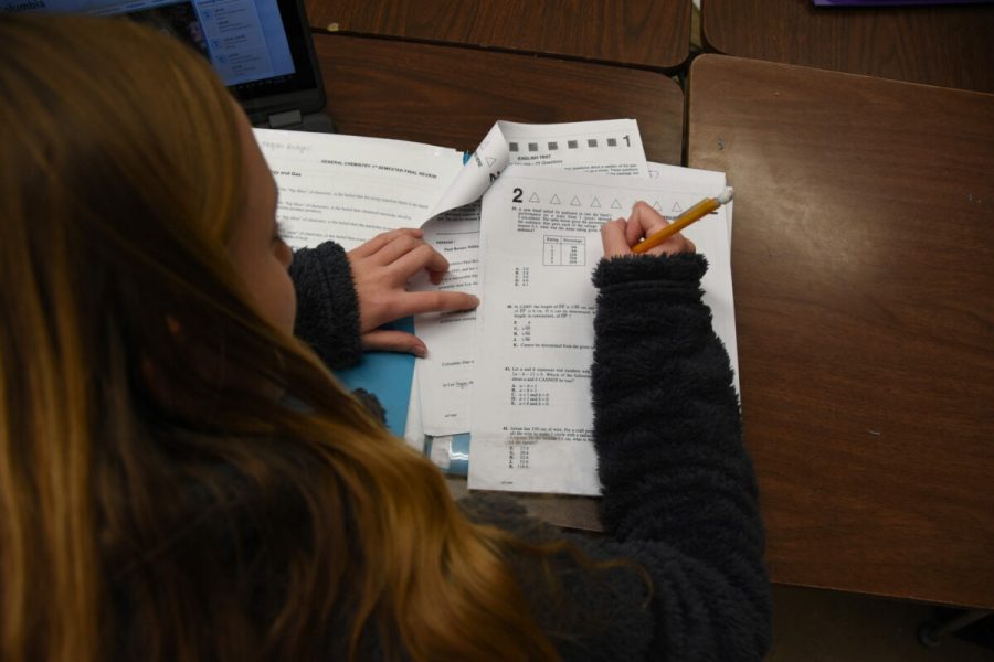 Junior Megan Rodgers practices for the ACT in her 3B ACT Prep class Dec. 20. The ACT Prep class is taught by Mrs. Jacquin, and is meant for students hoping to prepare for/ improve their scores on the ACT. The class lasts one semester, but is available both first and second semester.