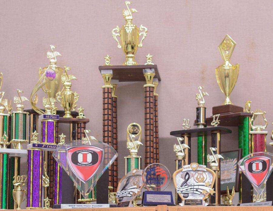 Trophies stand proudly in room 404, the band practice room. As one walks through the band hallway, its easy to see at least hundred trophies displayed, representing Rock Bridge High Schools impressive musical history. Photo by Ana Manzano
