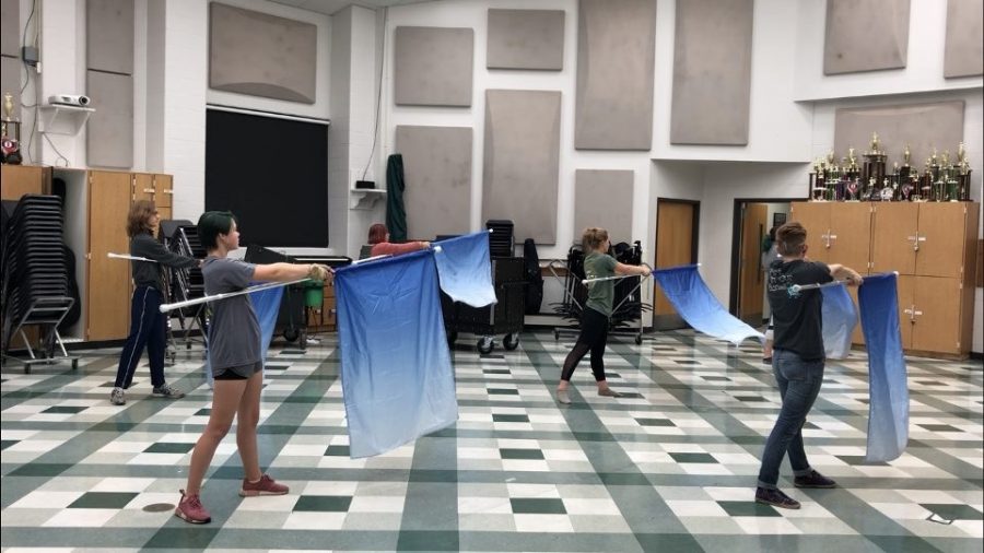 Winter Guard students work during after school rehearsal. Photo by Roy Ford  