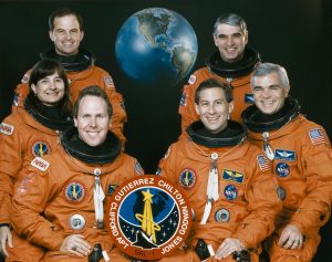 Linda Godwin (left side center) alongside other crew members part of the STS-59 space shuttle mission.