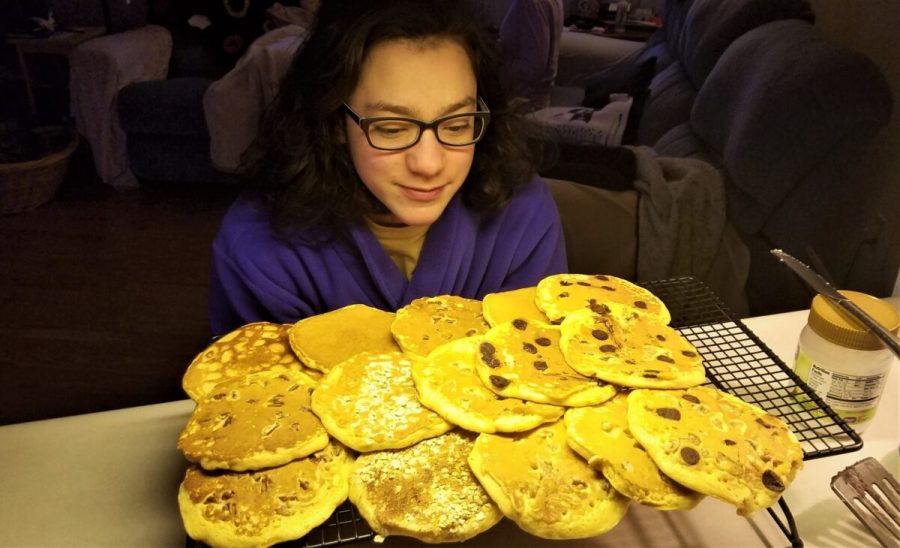 Junior Audrey Novinger makes homemade pancakes. Photo Doug Novinger.