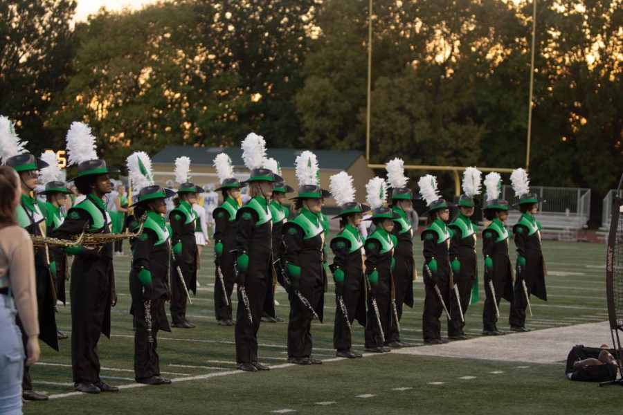 Emerald+Regiment+welcomes+the+RBHS+football+team+onto+the+field+at+their+game+against+Lutheran+High+School+of+St.+Charles+County%2C+Sept.+30.