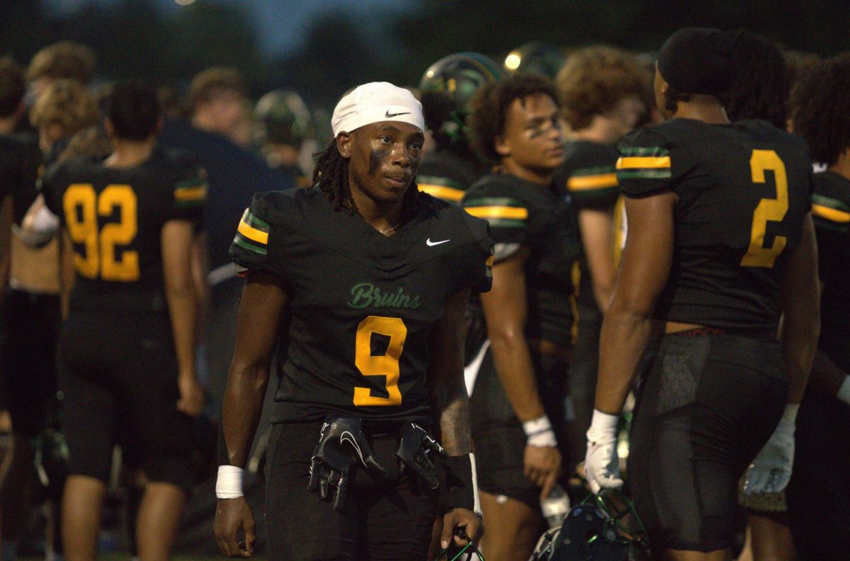 Stefan Williams (12) waits on the field. Photo by Allie Wood.