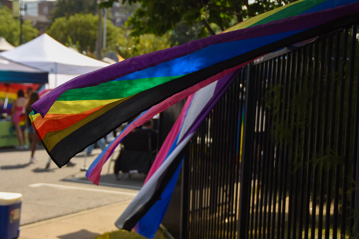 LGBTQ+ flags such as the rainbow-striped Pride flag, Non-Binary flag and Bisexual flag hang outside the Rose Music Hall in downtown Columbia MO on Sept. 23 and Sept. 24 for the MidMO PrideFest. 