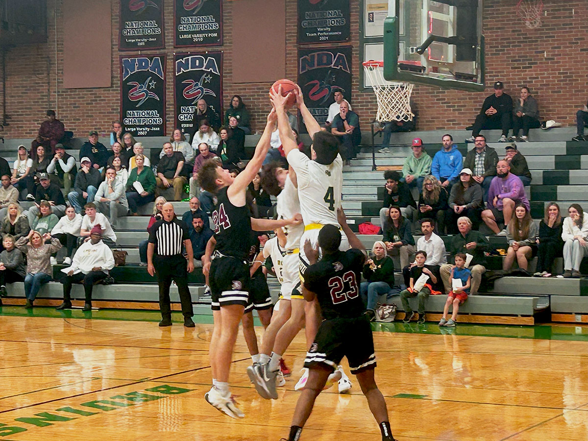 Brady Davidson (11) goes up strong for the rebound. The Bruins would lose 46 to 45 on a buzzer beater