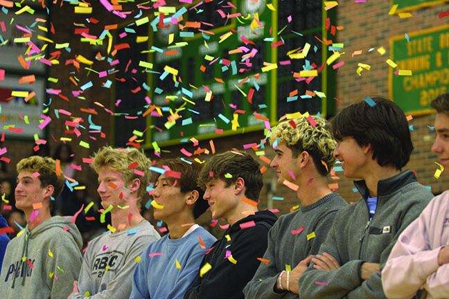 RBHS cross country team celebrates state championship during Thanks assembly.