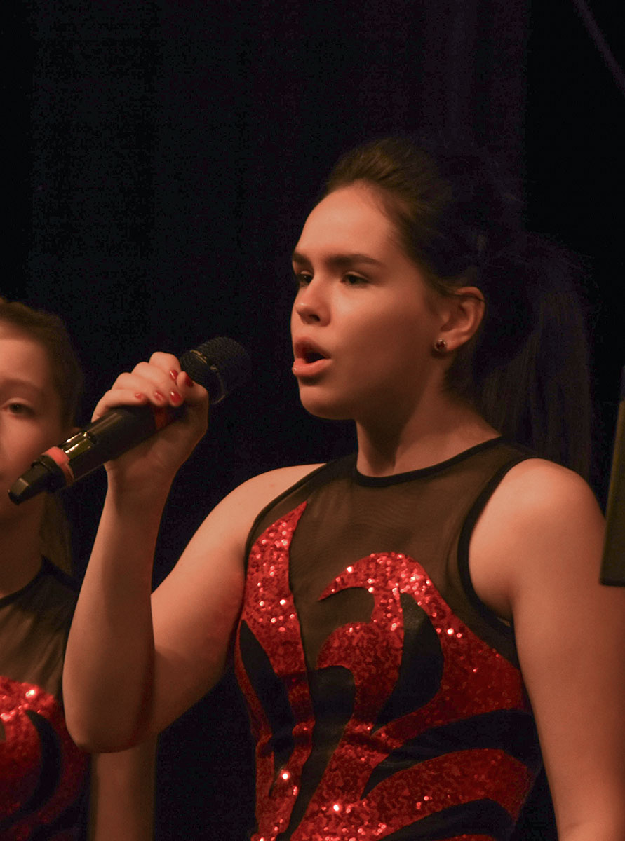 Show choir member Ellie Carlson (12) performs her solo of Stairway to Heaven during the City Lights performance. The show choir City Lights performance premiered Jan. 11 in the RBHS PAC. 
