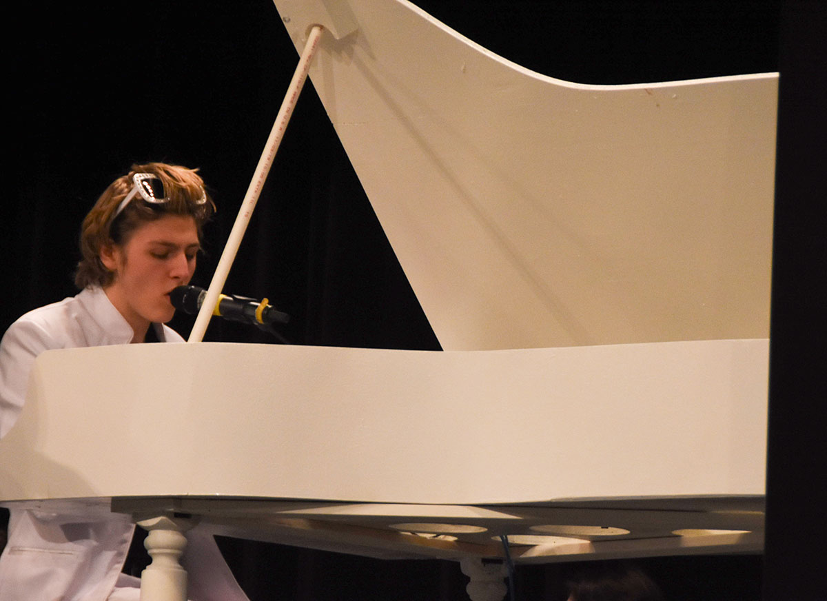 Reid Fairlamb (11) sings his solo for the song Candle in the Wind/Saturday Night (its alright for fighting) by Elton John. The RBHS Show Choir performance City Lights premiered Jan. 11. 