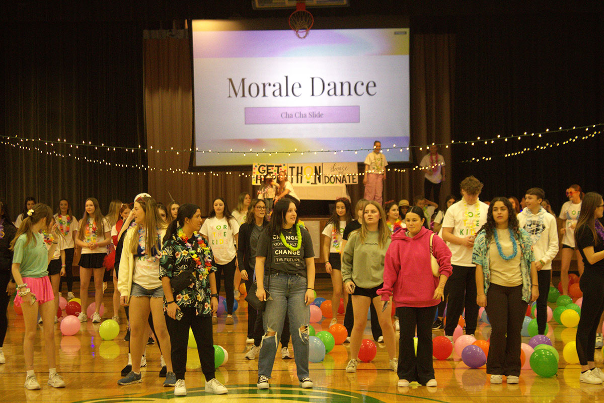 Sophie Connell leads the Cha Cha slide at Bruinthon. Bruinthon, held on Feb. 10 helped many by promoting charity and dancing with friends
