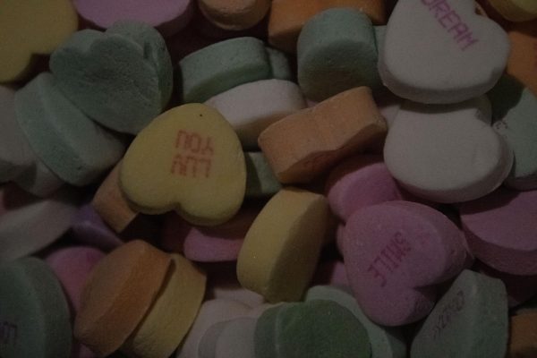 Photo of the popular Valentines Day candy conversation hearts. This treat dates back to 1847 and were originally used as throat lozenges. However, by the early 1900s they became a sweet treat to gift to a friend or valentine.  