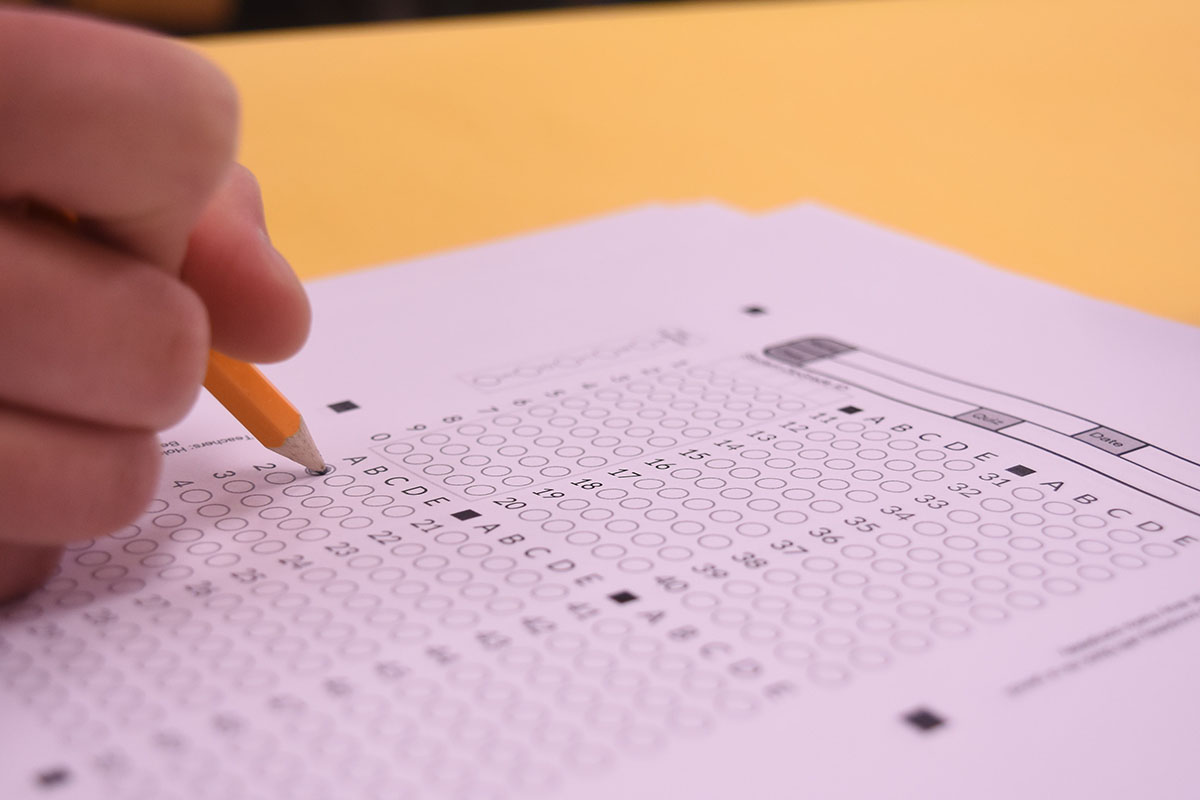 Photo of student filling out test bubble sheet. RBHS will hold March Mathness Saturday, March 16. 