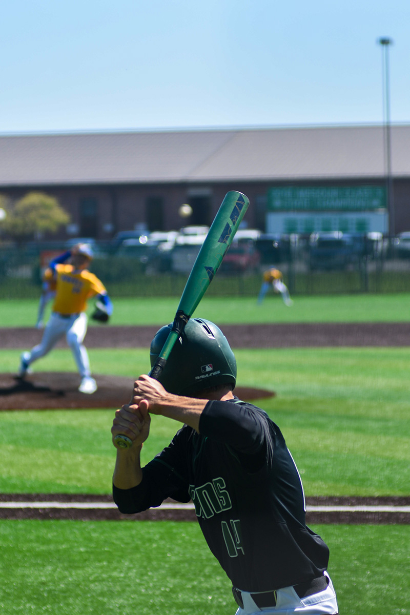 Grayson Fick (12) practices in the on deck circle. RBHS bruins won 4-1 at the baseball game Saturday, April 20. 
