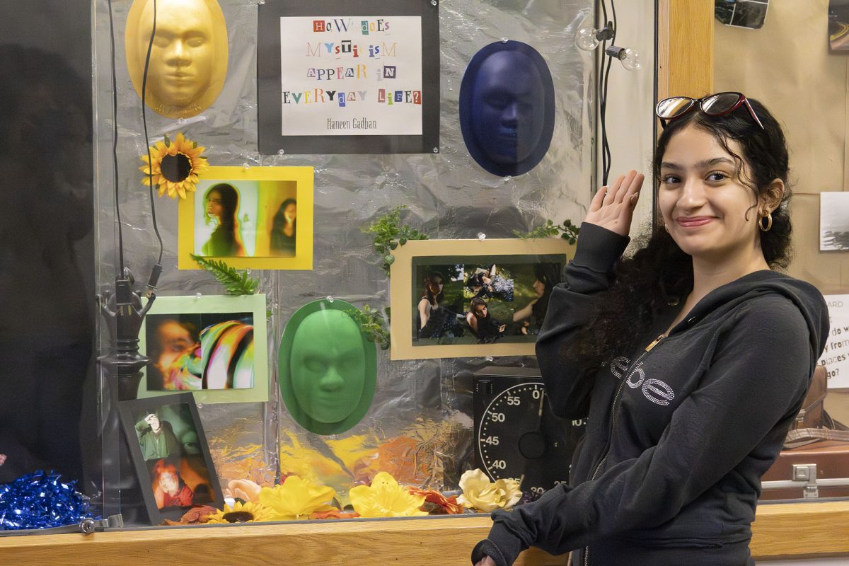 Standing in front of her showcased photography portfolio, RBHS senior Haneen Gadban presents her artwork. She used her photography portfolio to answer the question ‘How Does Mysticism Appear In Everyday Life?’. “We had to brainstorm ideas that we wanted before we created that idea. And I found that a lot of my ideas had [...] all these things that all went under mysticism.”