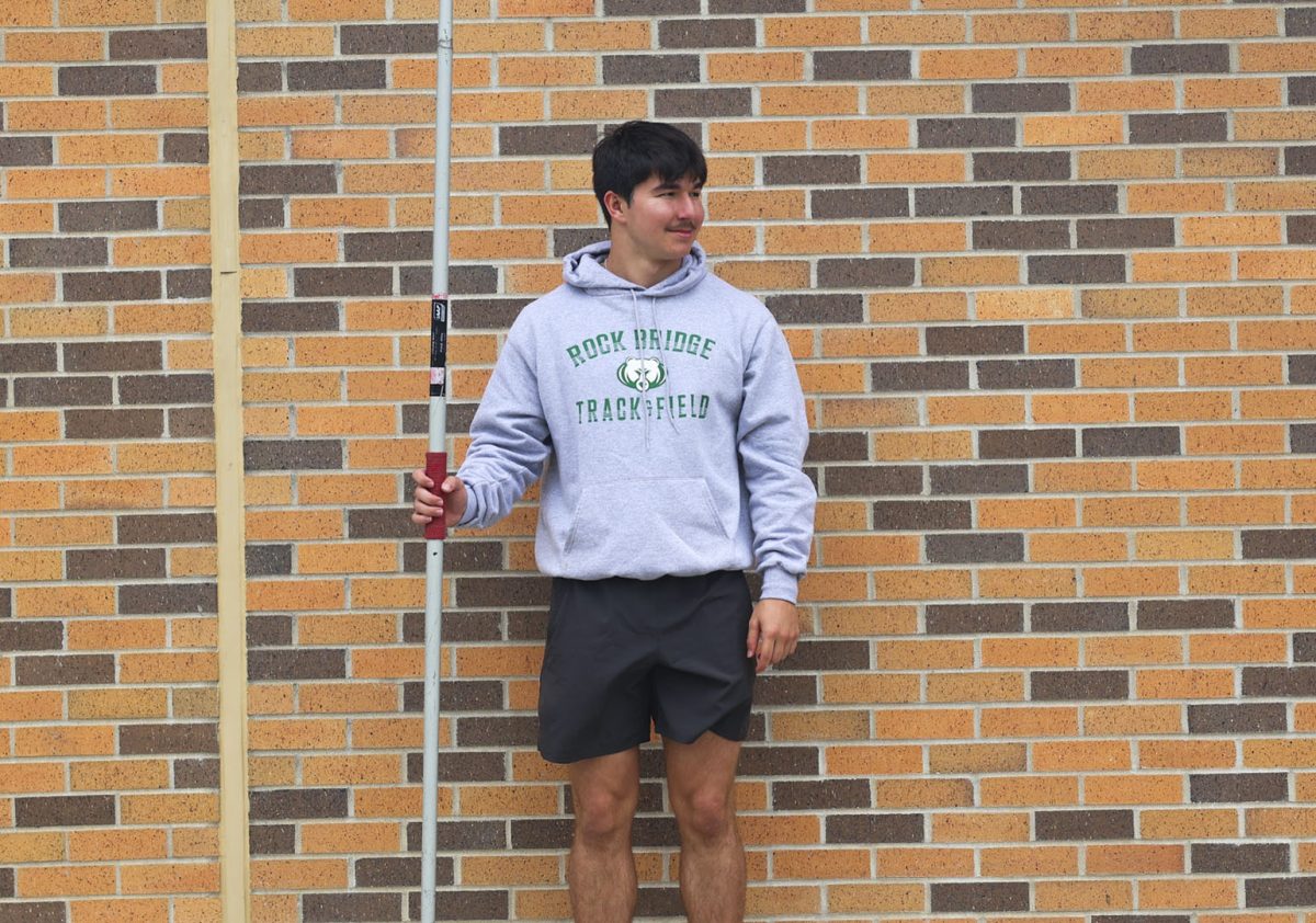 Gripping his javelin, Rock Bridge High School Senior Brody Wood stands back and watches his team since his season took an unexpected turn. A key competitor in javelin throwing at RBHS, Wood unexpectedly tore his UCL at the Timberland Invitational on April 10. “I was thinking about throwing javelin in college, but that door has been closed right now.” Wood says. “Thinking about coaching in college for javelin at a high school.” 